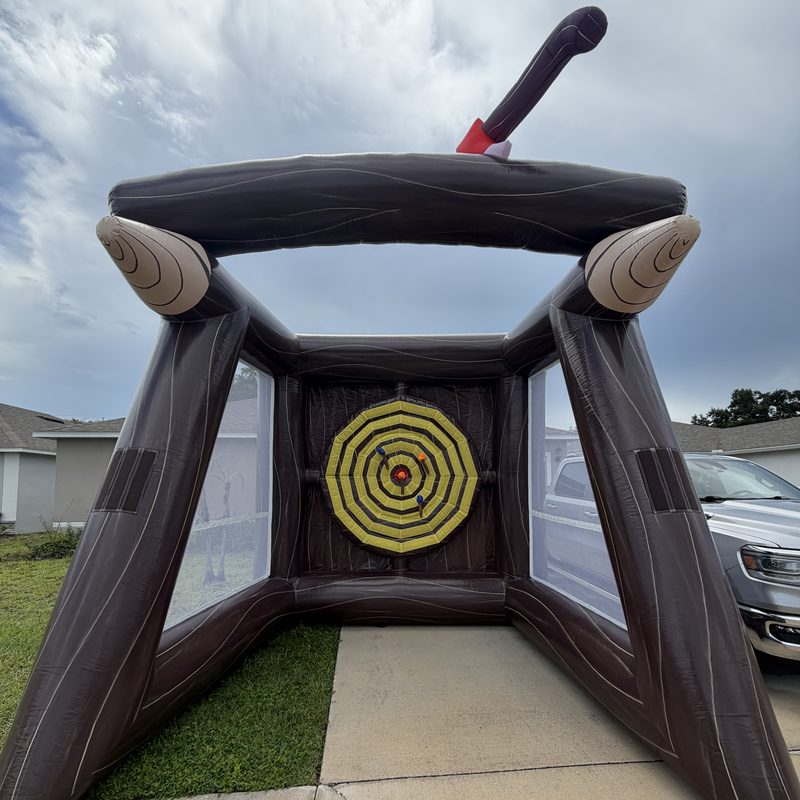 Inflatable axe throw game with a yellow target