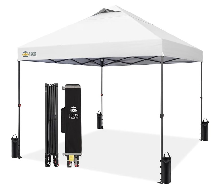 White 10 by 10 foot pop-up canopy with weight bags