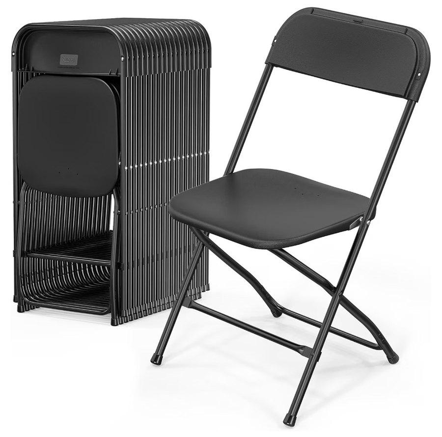 Black folding chairs, one open and a stack of folded chairs