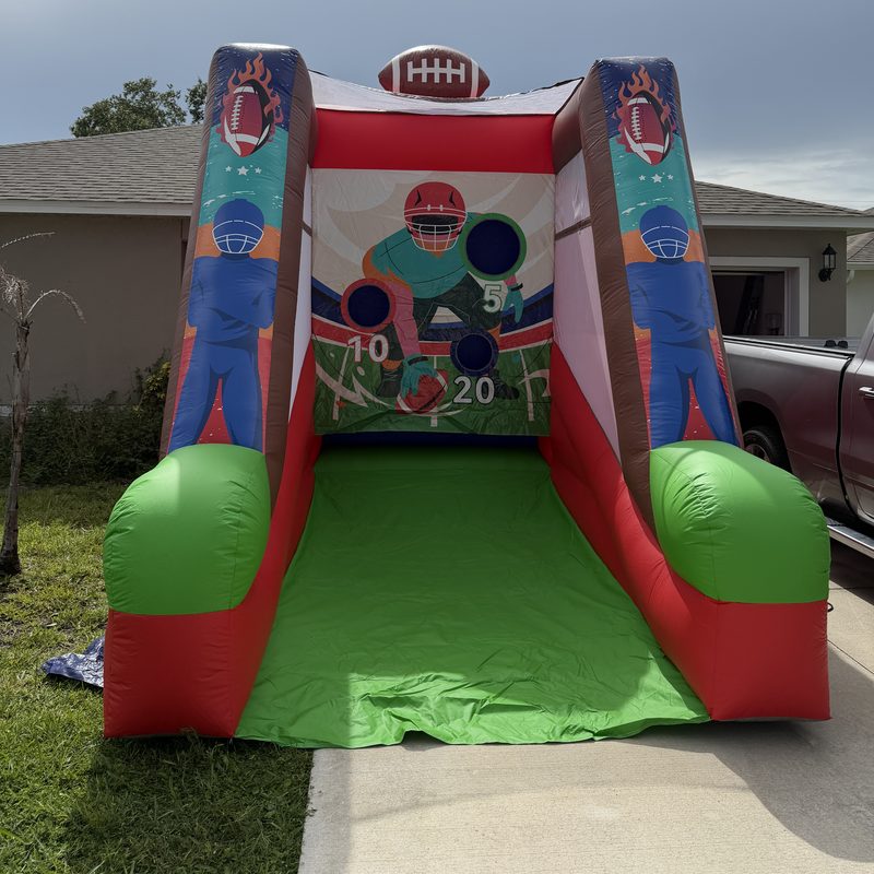 Inflatable football throw game with scoring targets
